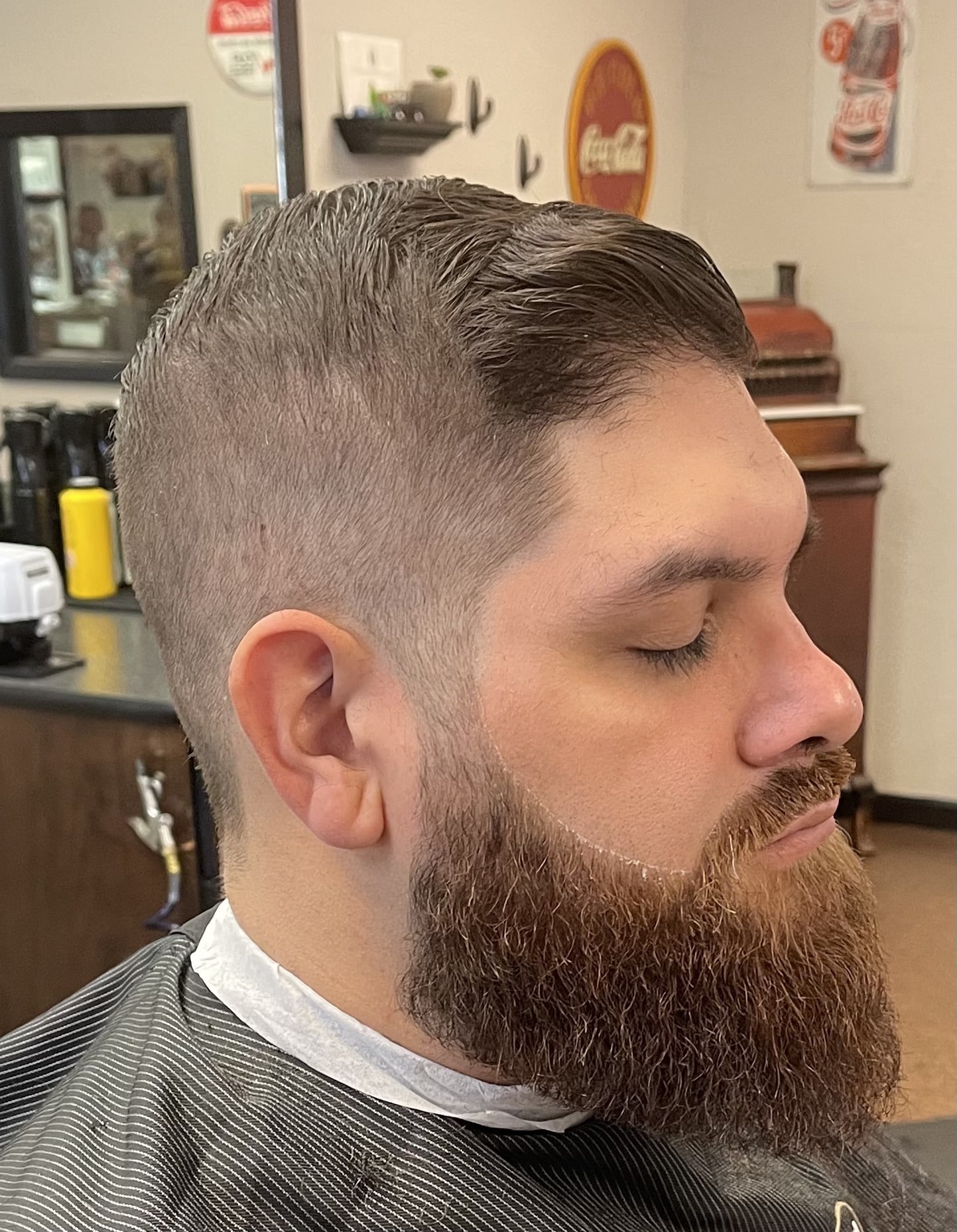 young man with fade and beard trim